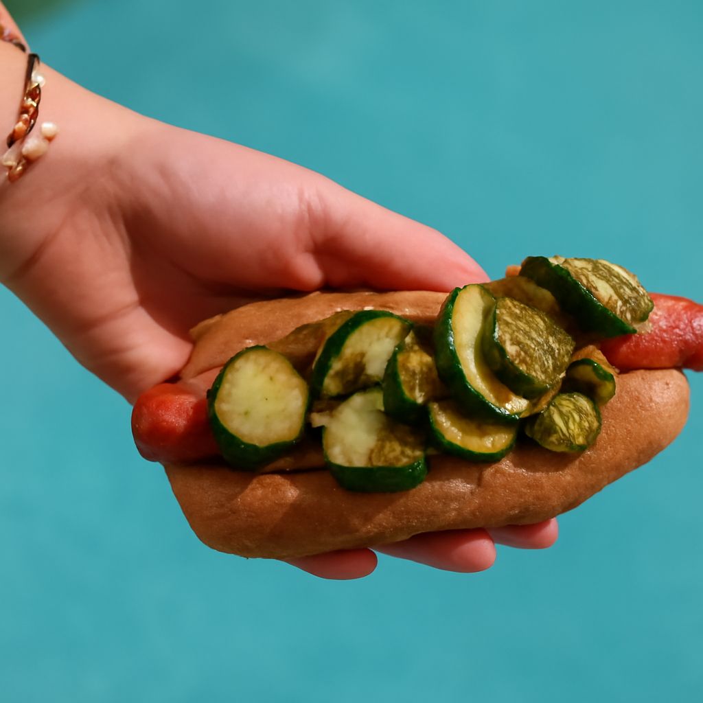 New Jersey Italian hot dog with fried potatoes, peppers, onions, and a hot dog in pizza bread